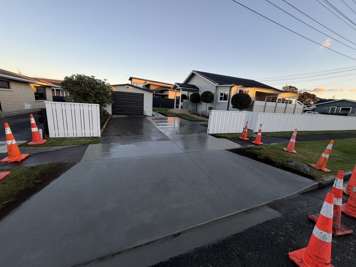 80 sqm plain broom finish driveway extension and vehicle crossing, photo 1 of 2